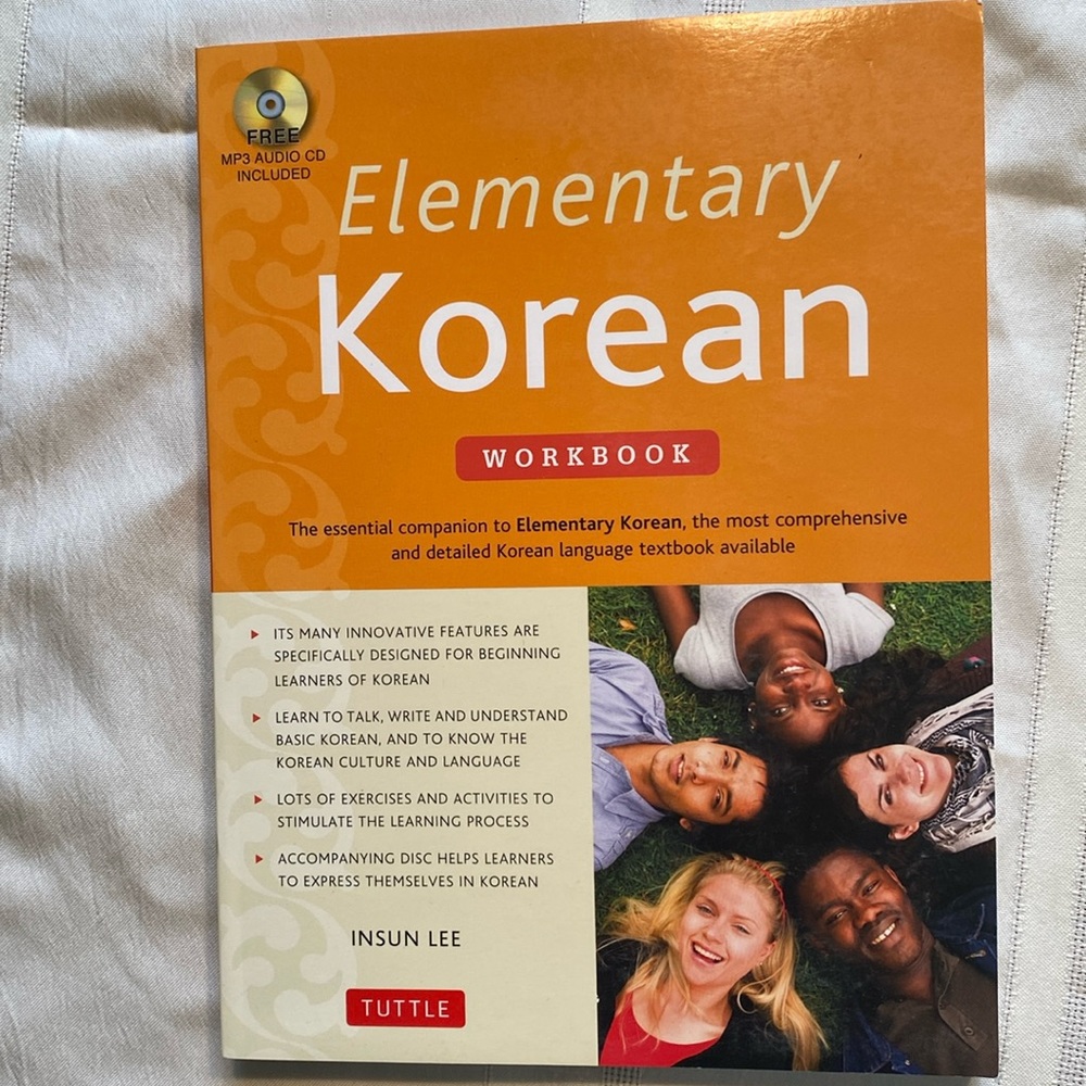 Elementary Korean workbook with included mp3 audio cd. Never opened